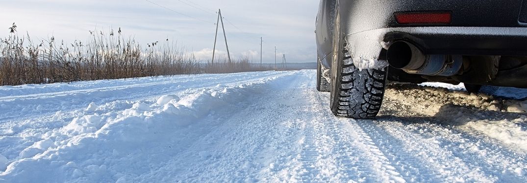 Vehicle driving on a snow covered road