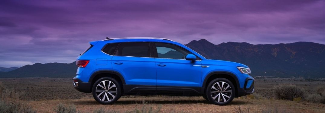 Volkswagen Taos parked outside side view
