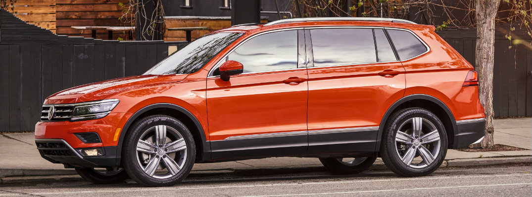 Side profile of 2018 VW Tiguan in Habanero Orange Metallic