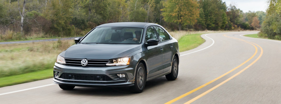 2018 VW Jetta Driving Through a Forest Road