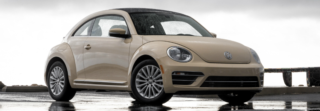Side view of cream-colored 2019 Volkswagen Beetle