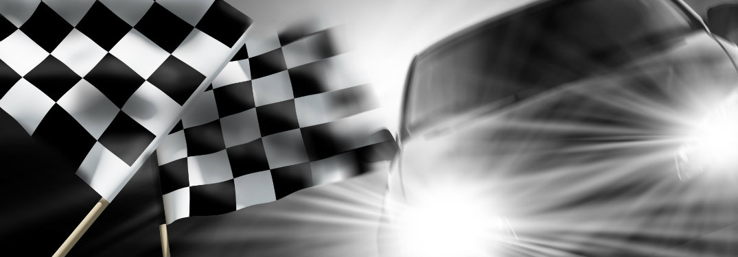 checkered-flags-with-generic-racing-car-with-headlights-on
