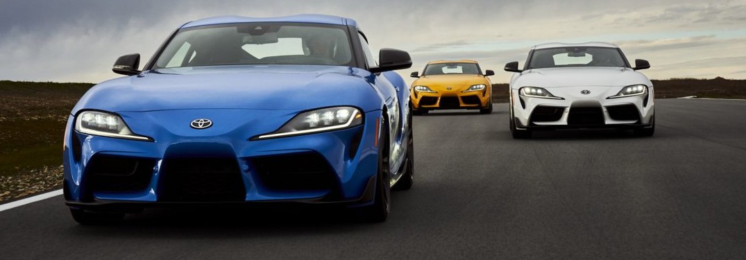 Blue, white, and yellow versions of the 2021 Toyota GR Supra