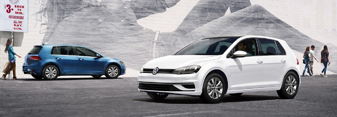 Two 2021 Volkswagen Golf hatchbacks parked by each other