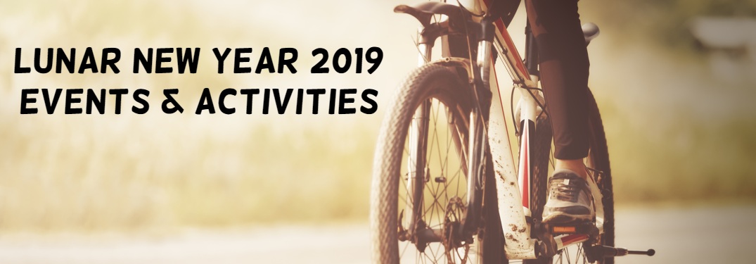 Close-up on a young woman riding a bike with text that reads "Lunar New Year 2019 Events & Activities"