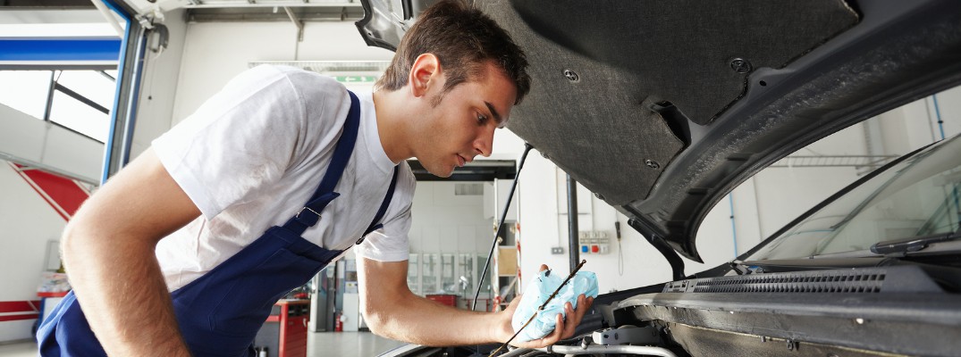 man working on vehicle