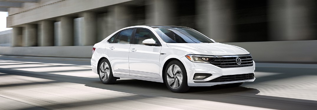 2020 Volkswagen Jetta White driving under bridge with shadows