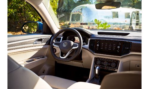 2021 Volkswagen Atlas interior showing steering wheel and cabin in sunlight