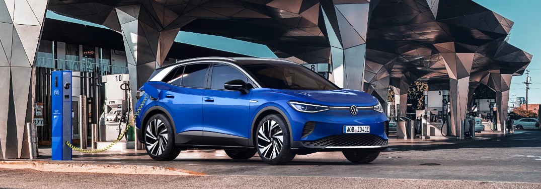 2021 Volkswagen ID.4 blue parked at charging station