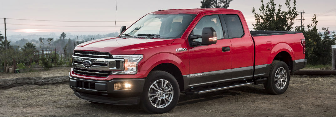 side view of a red 2018 Ford F-150 Diesel model