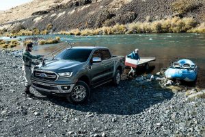 front view of a chrome 2019 Ford Ranger parked near a lake