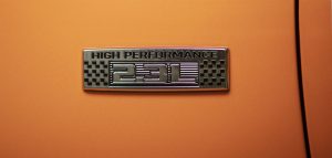 high-performance badge on a 2020 Ford Mustang