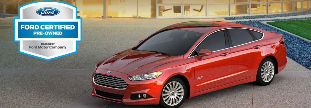 side view of a red certified pre-owned Ford