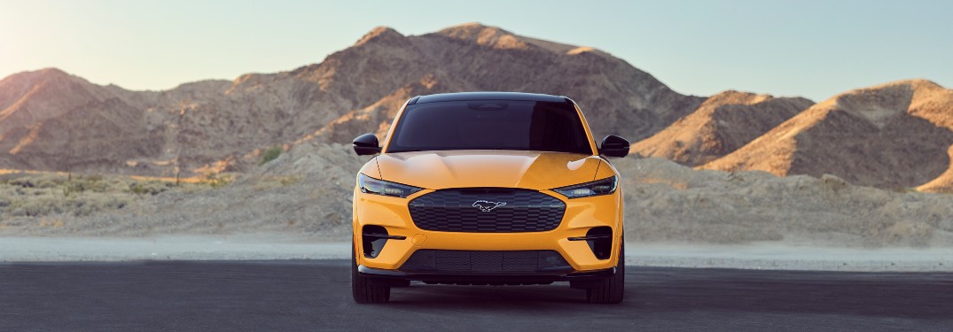 front view of a yellow 2021 Ford Mustang Mach-E