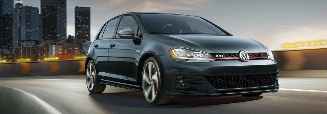 Passenger side exterior view of a black 2018 VW Golf GTI