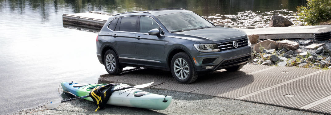 Passenger side exterior view of a gray 2018 VW Tiguan