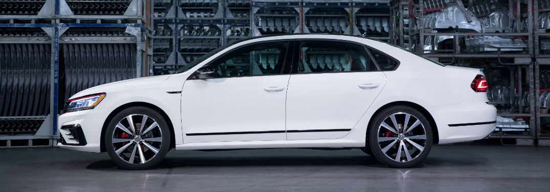 Driver side exterior view of a white 2018 VW Passat