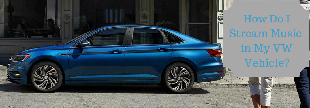 How Do I Stream Music in My VW Vehicle, text on an image of a blue 20190 Volkswagen Jetta