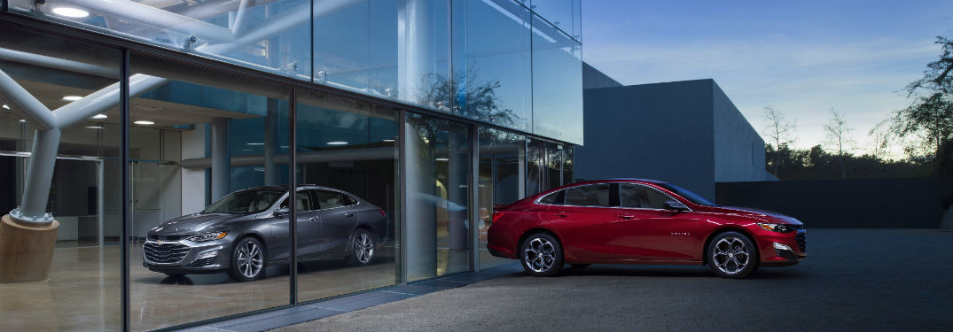 2019 Chevy Malibu parked outside of a showroom