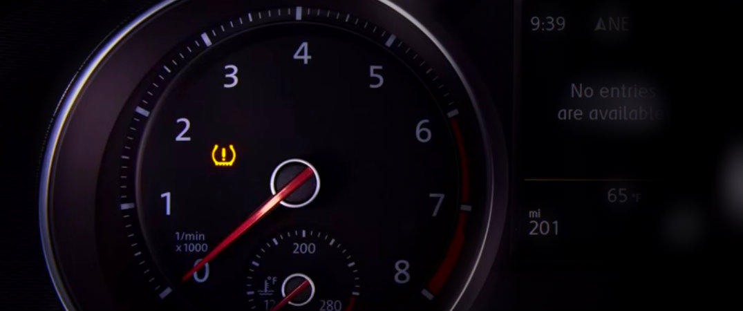 car speedometer with tire pressure light on