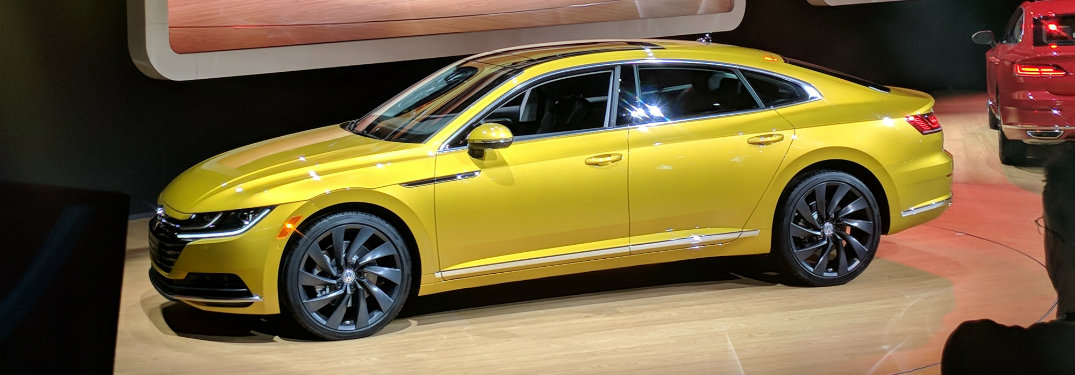 gold-yellow volkswagen arteon