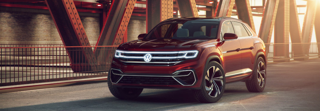 red volkswagen atlas cross sport on bridge