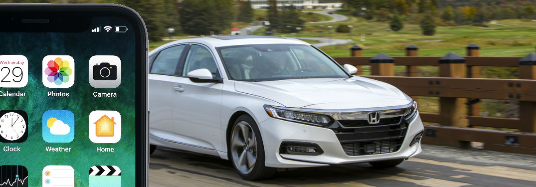 white 2018 Accord with a phone in front of it