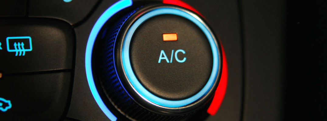A stock photo of a air conditioner control knob in a car.