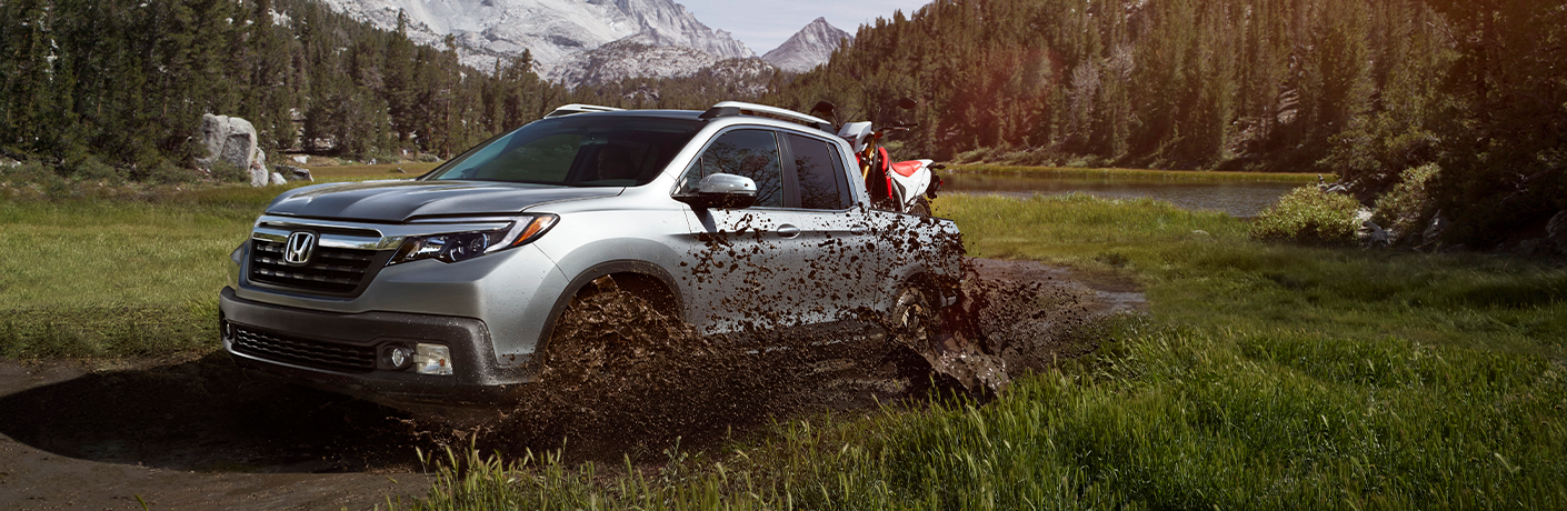2020 Honda Ridgeline splashing through mud