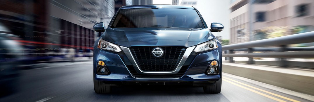 2020 Nissan Altima driving down the city street