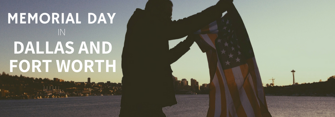 Man Holding an American Flag with a Skyline in the Background
