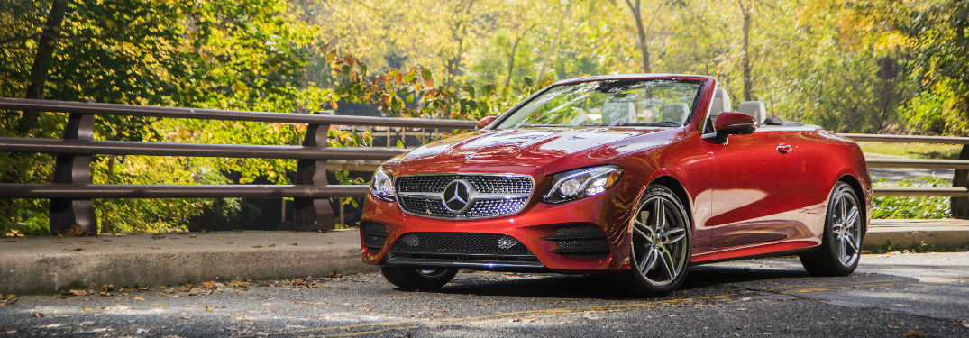 2018 E-Class Cabriolet in red parked on a bridge