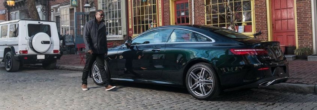 man getting into mercedes-benz sedan