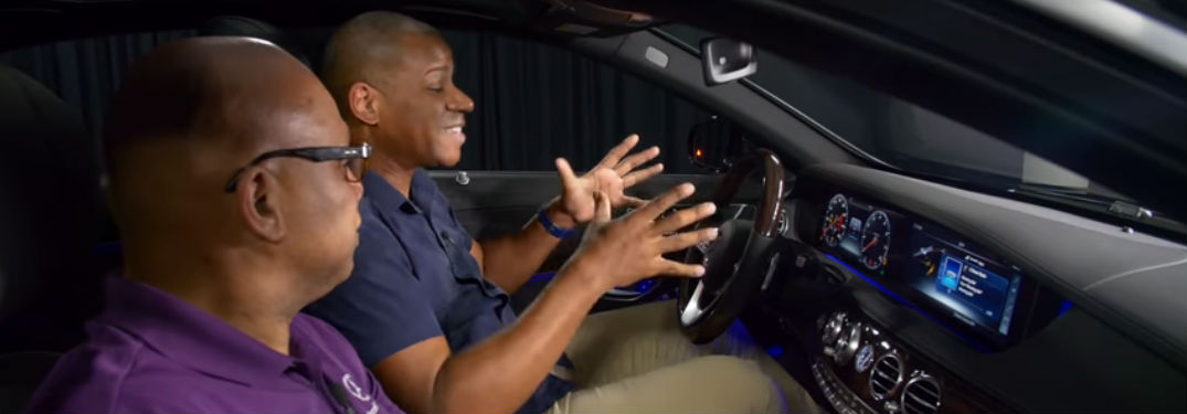 Brad Perry sitting in the S 450 with a Mercedes-Benz of Scottsdale salesman