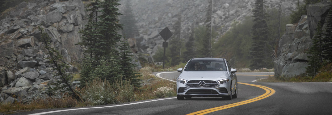 2019 MB A-Class exterior front fascia driving on winding road