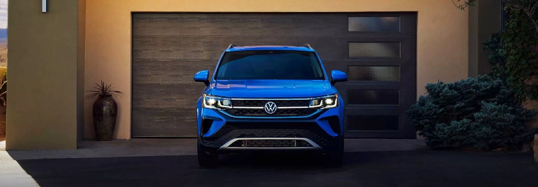 2022 Taos parked in front of garage door