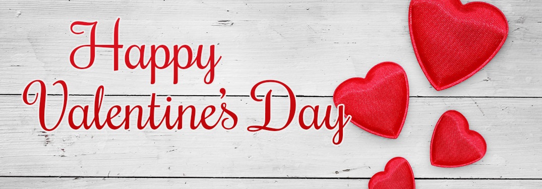 Happy Valentine's Day graphic with a whitewashed wood background and red hearts