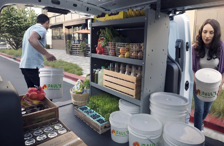 Couple loading 2021 Ford Transit Connect cargo van