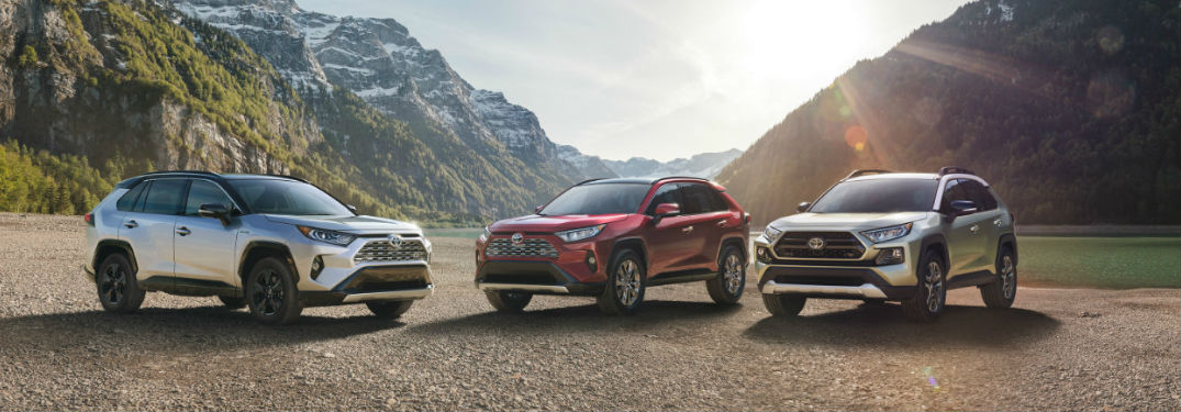 three 2019 Toyota RAV4 models parked