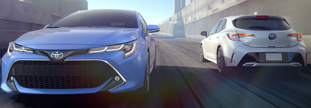 two 2019 Toyota Corolla Hatchback models driving