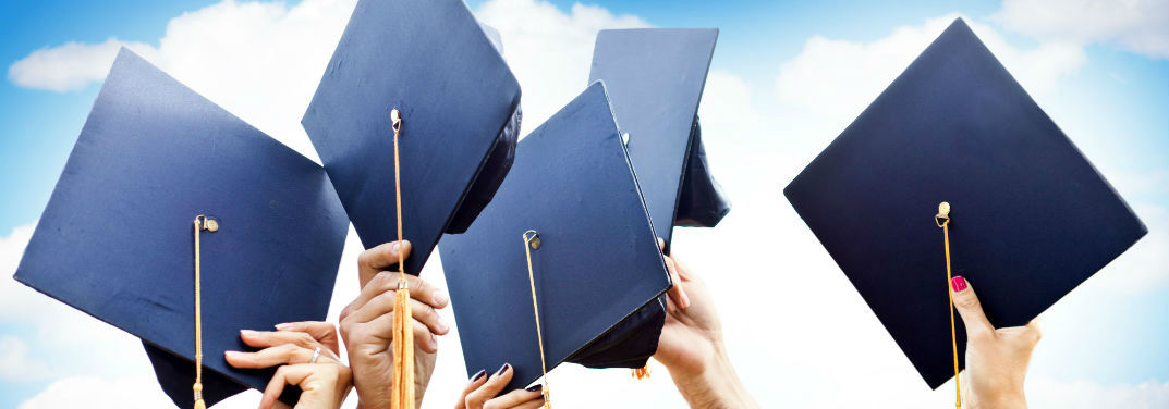 The Toyota College Grad Rebate with image of people holding graduation caps