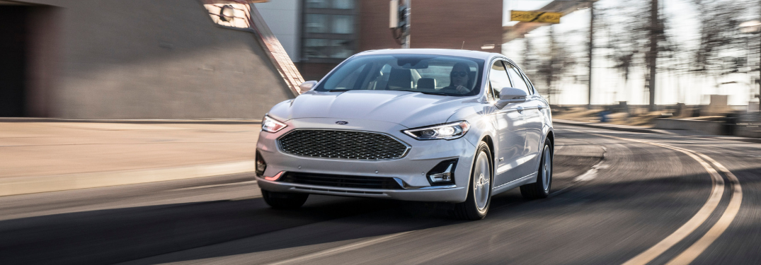 front and side view of white 2019 ford fusion