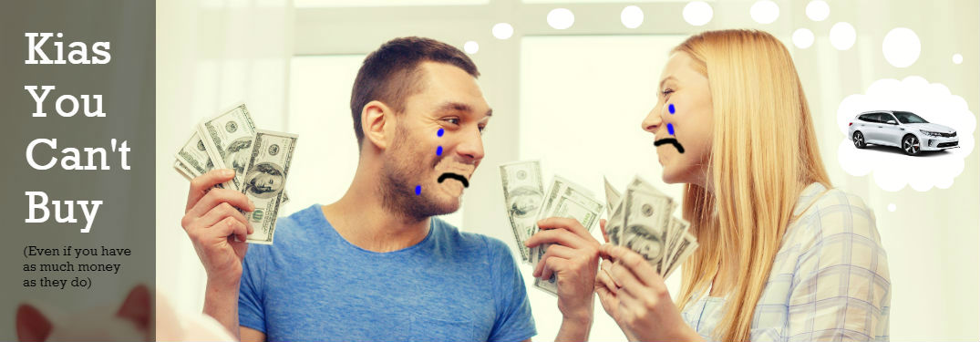 teary couple holding up money and thinking about kia optima wagon