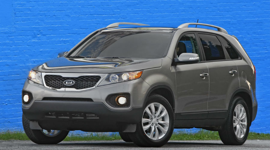 exterior of 2011 kia sorento on blue background