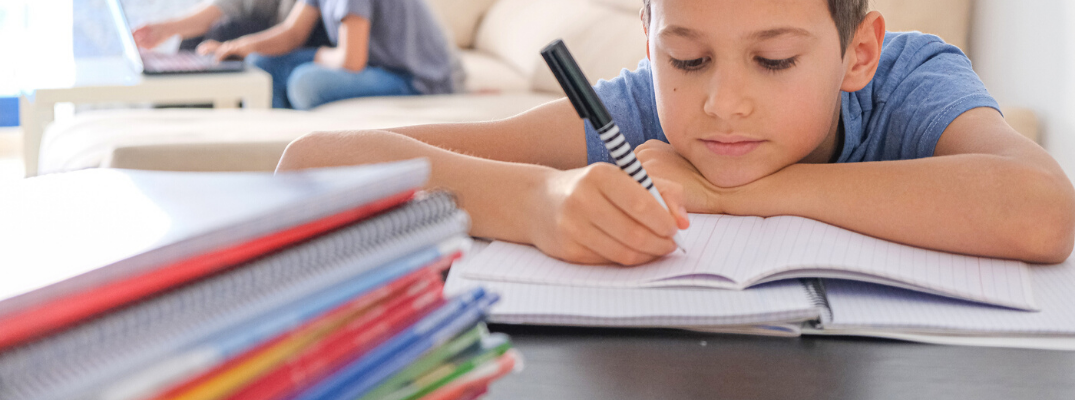 Kid coloring with markers