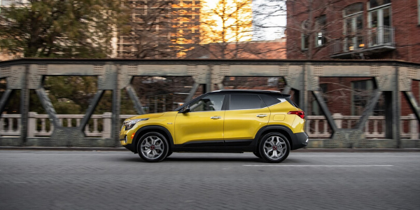 Side view of yellow 2021 Kia Seltos