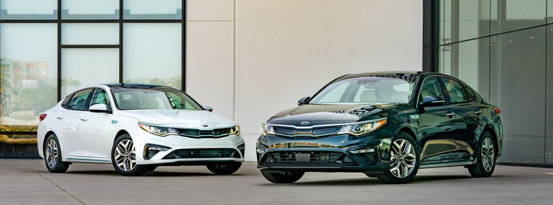 White and black 2020 Kia Optima Hybrid models