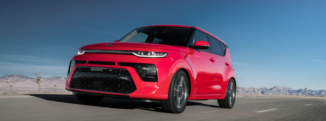 Red 2021 Kia Soul driving