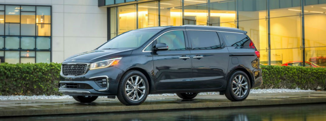 Side view of black 2021 Kia Sedona