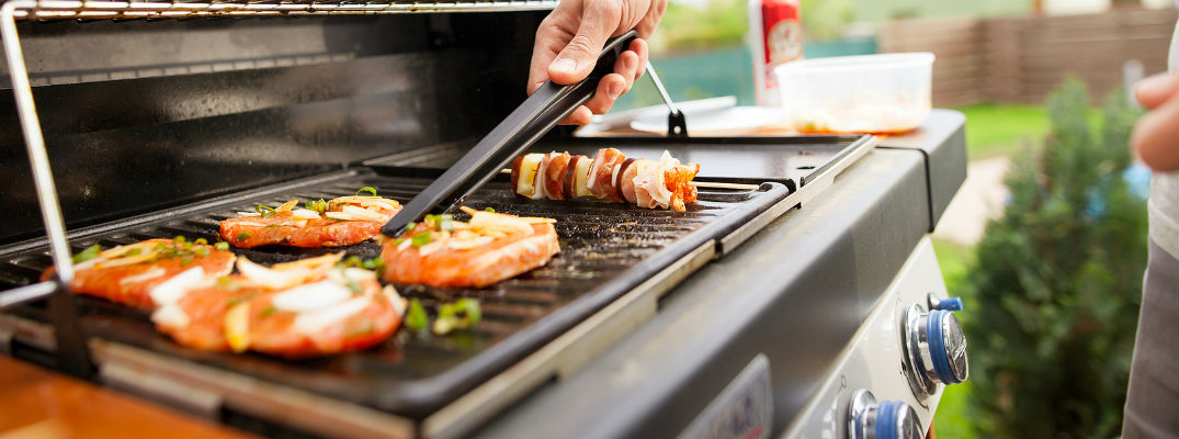 Closeup of person grilling